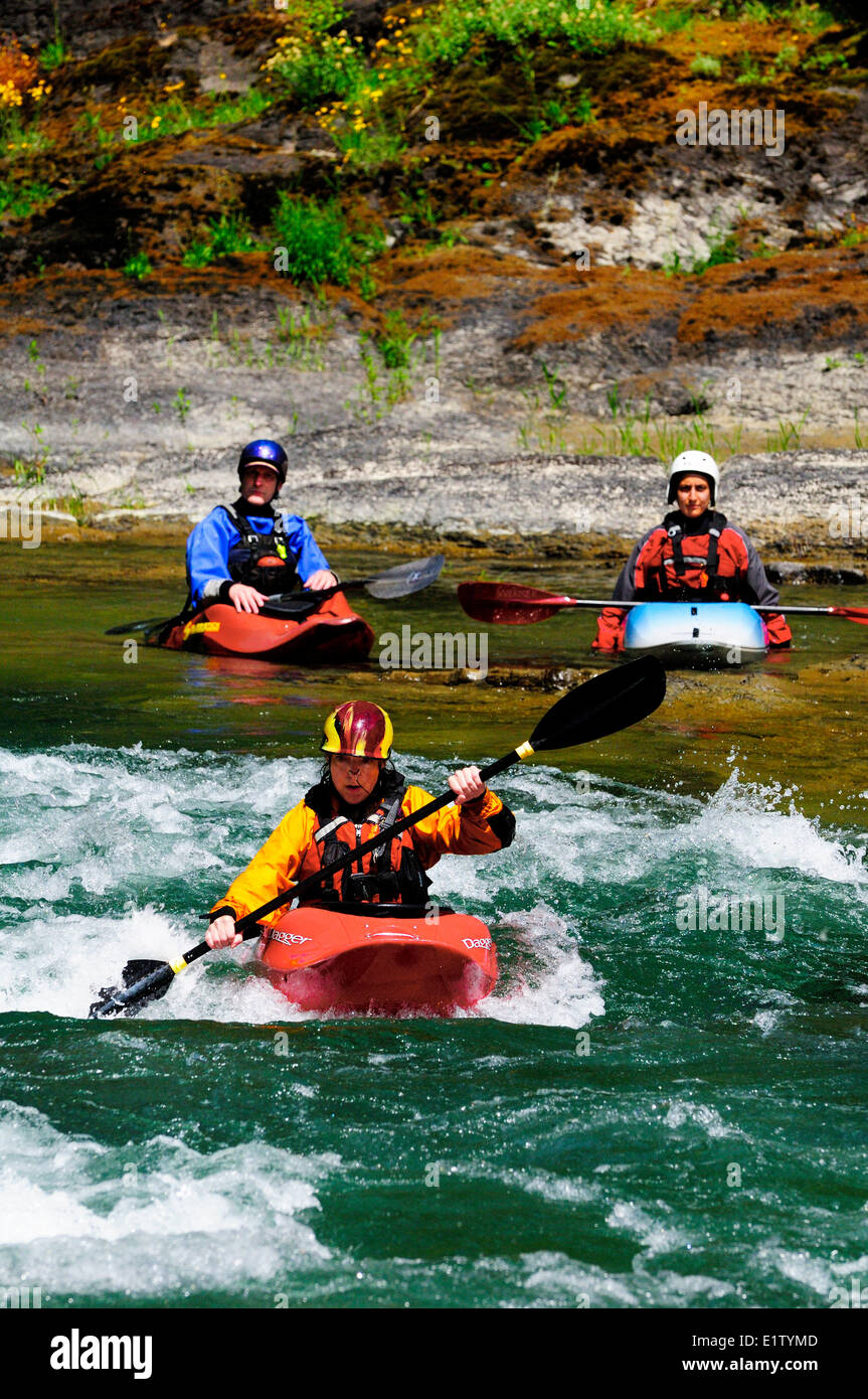 Kayakers near Horseshoe Bend on the Cowichan River near Lake Cowichan