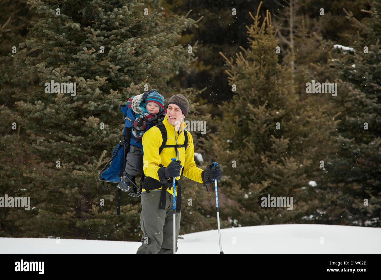 A father and a newborn boy going for a snowshoe at Peter Lougheed Provincial Park,  Kananaskis, AB Stock Photo