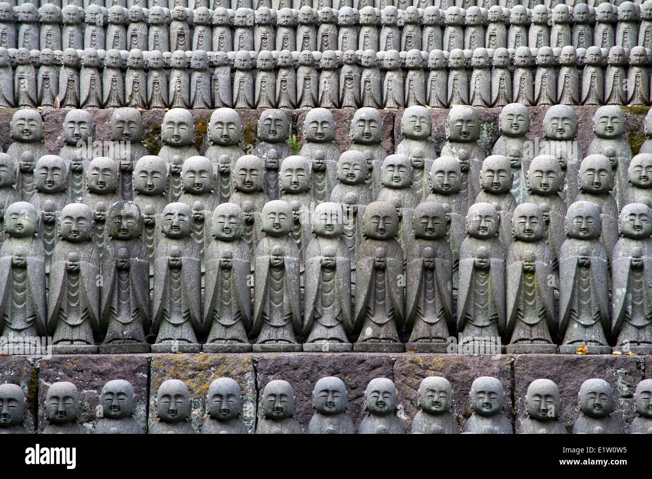Numerous Jizo statuettes displayed at the entrance of Hasedera temple in Kamakura, Japan Stock Photo