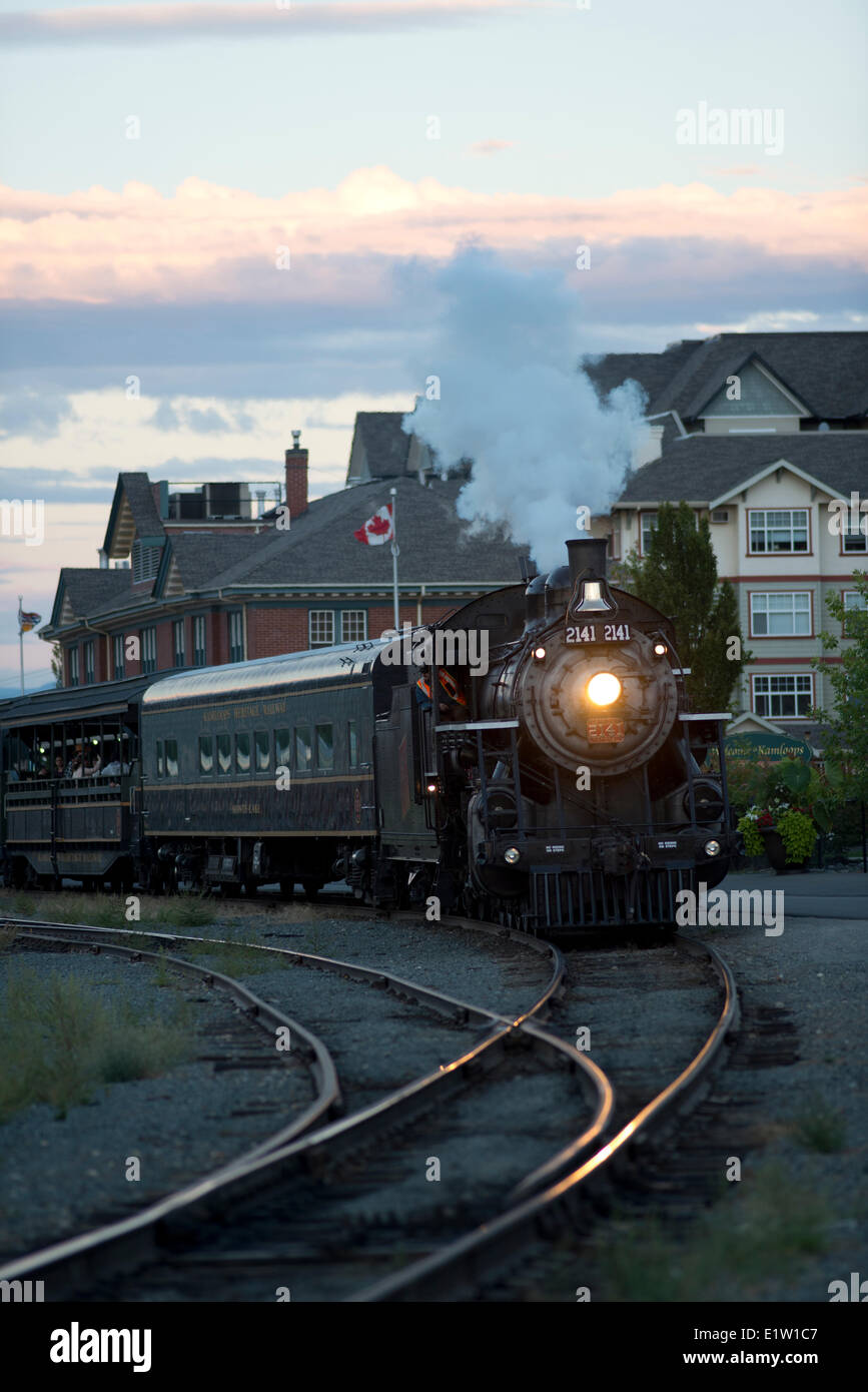 KHR 2141 - The Spirit of Kamloops steam locomotive departs the station in Kamloops, BC, Canada. Stock Photo