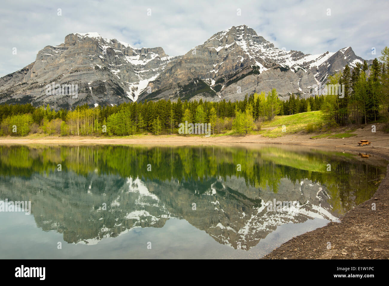 Mountains reflected in Wedge Pond, Kananaskis Provincial Park, Alberta, Canada Stock Photo