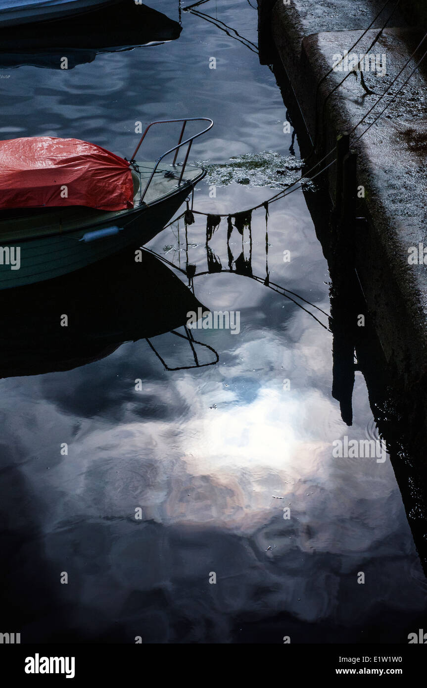 moored boat in oily water, machinery, tool, day, engineering, mechanize, adult, private, occupation,vertical, engineer, worker, Stock Photo