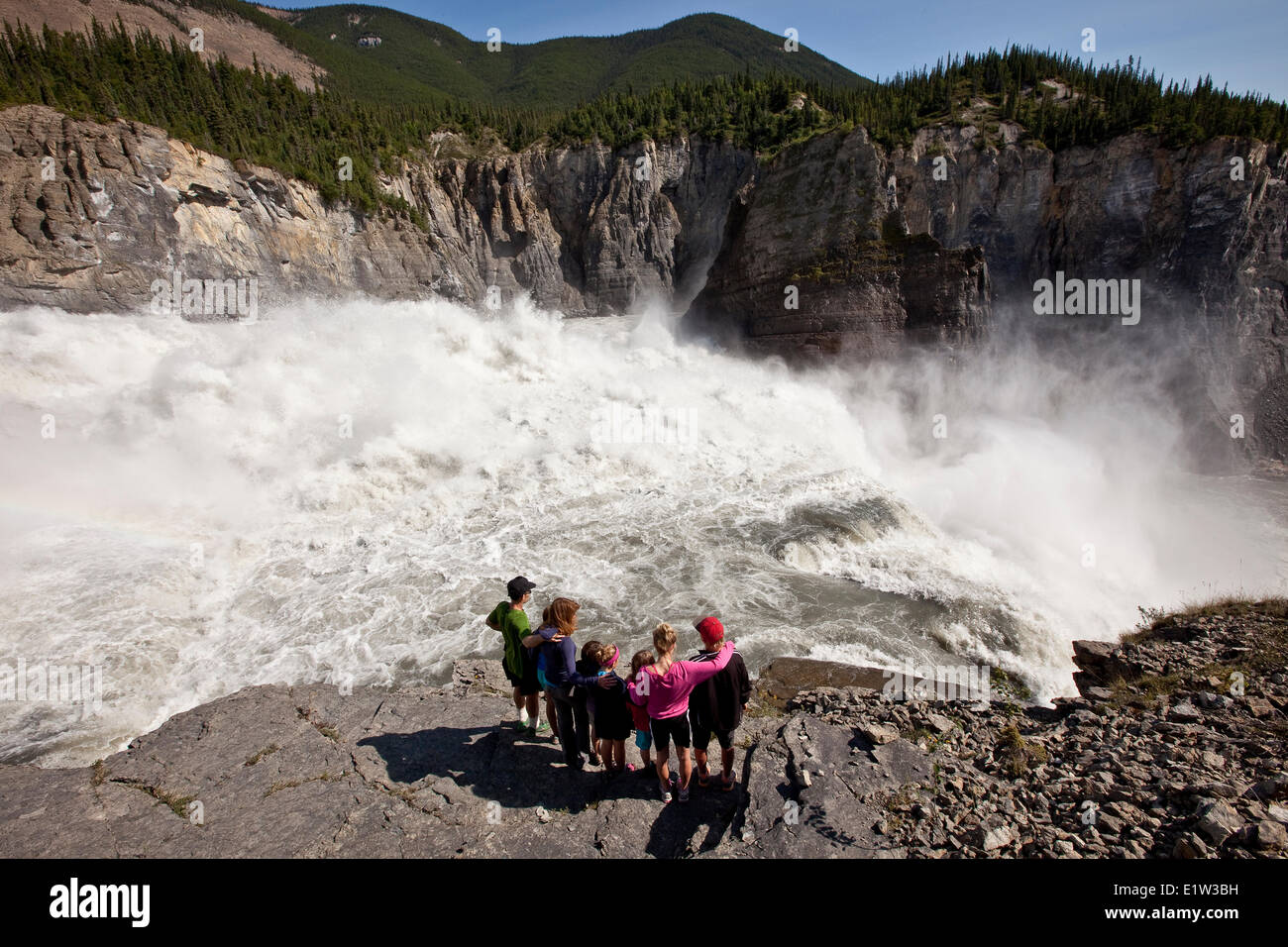 Family enjoy view at Sluicebox, Virginia Falls, Nahanni National Park Preserve, NWT, Canada. Stock Photo
