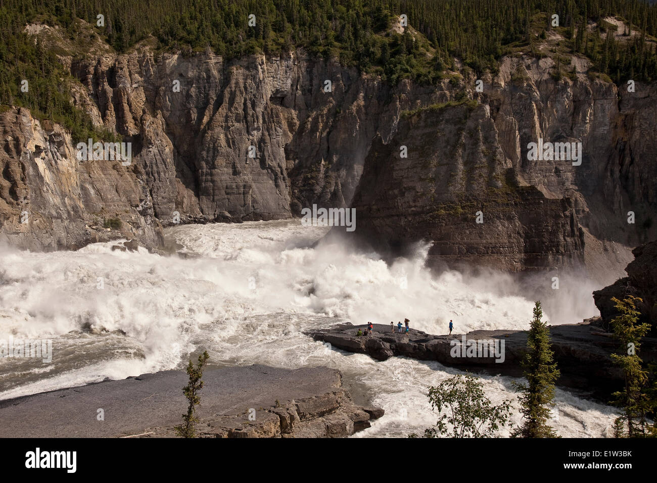 Group of people enjoy view at Sluicebox, Virginia Falls, Nahanni National Park Preserve, NWT, Canada. Stock Photo