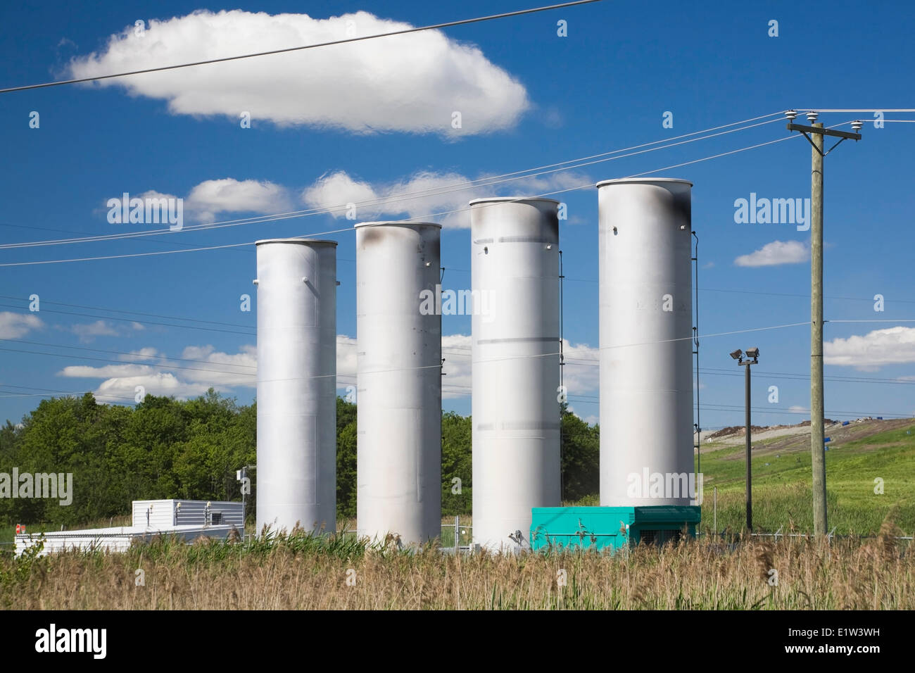 Clean-gas emission stacks at a waste management site, Quebec, Canada Stock Photo