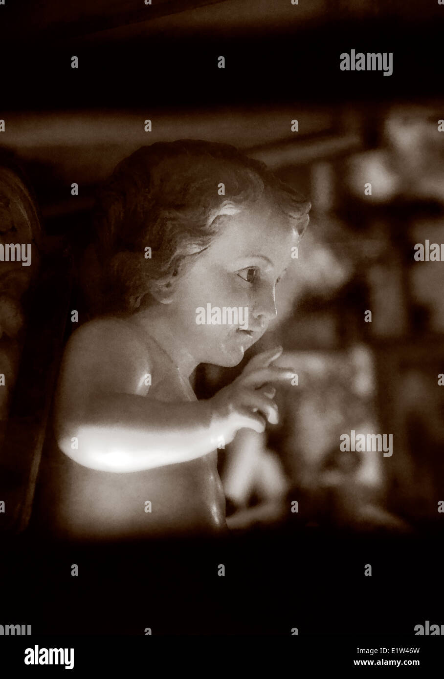 Antique doll in shopwindow Stock Photo