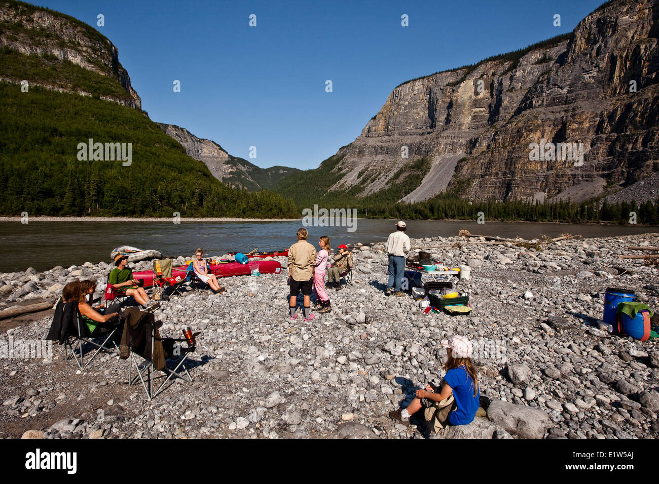Group of people camped on Nahanni River, Nahanni National Park Preserve, NWT, Canada. Stock Photo