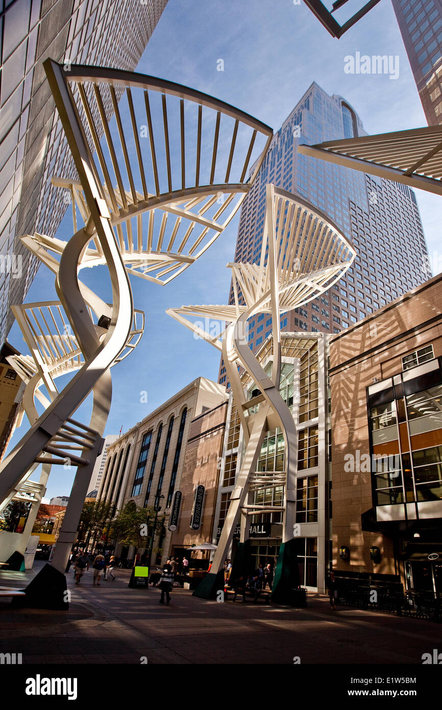 The steel «Trees« sculpture designed to reduce wind gusts between the buildings on Stephen Avenue, downtown Calgary, Alberta, Ca Stock Photo