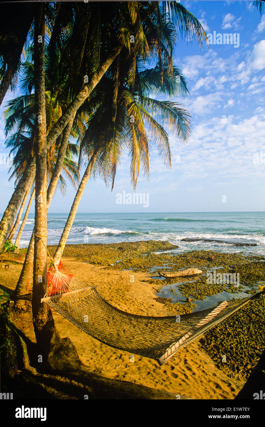 Hammock on coastline, Cahuita, Costa Rica Stock Photo