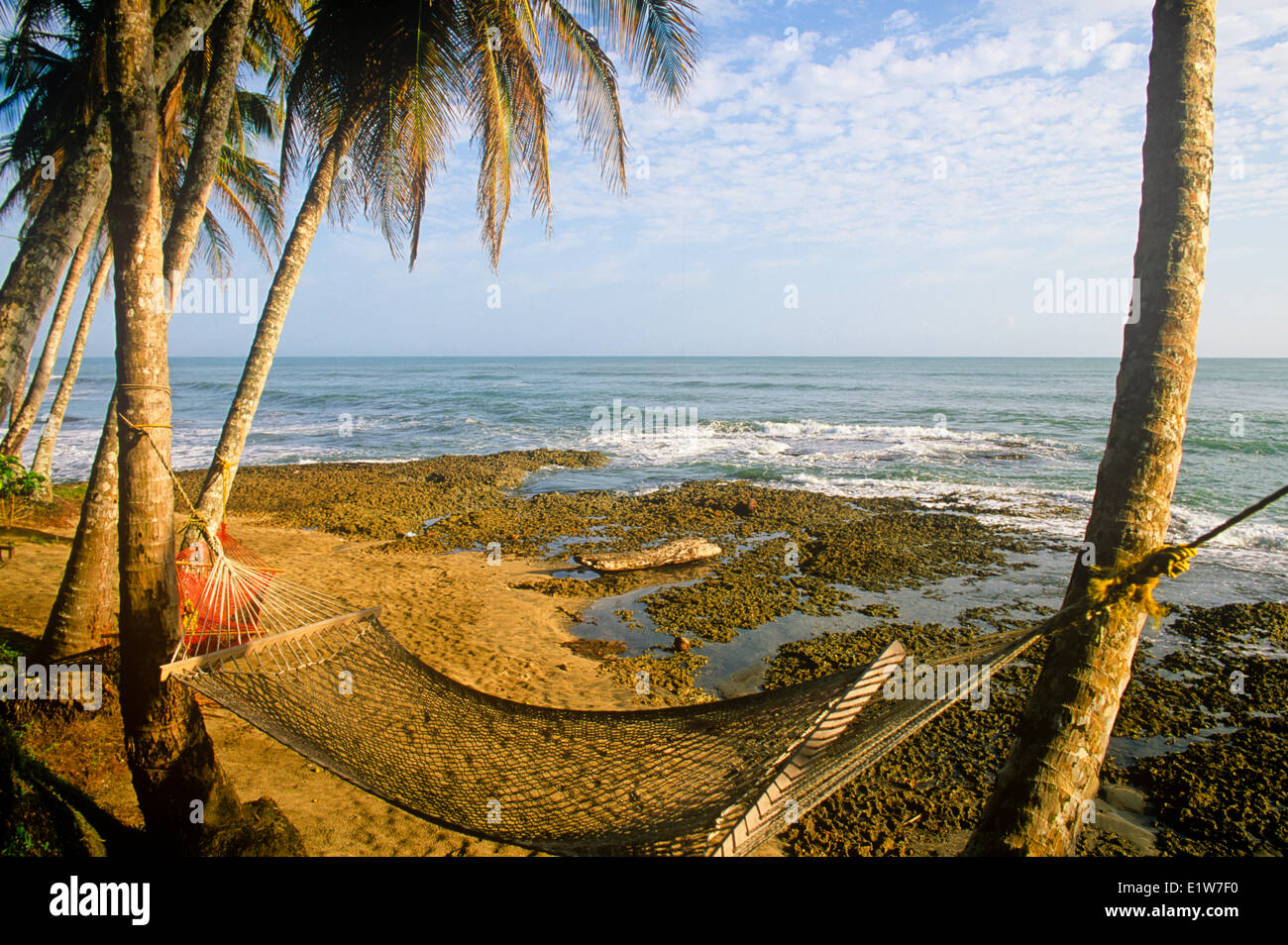 Hammock on coastline, Cahuita, Costa Rica Stock Photo