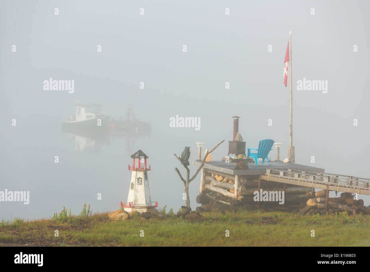 Wharf in fog, Walters Cove, LaHave River, Lunenburg County, Nova Scotia, Canada Stock Photo