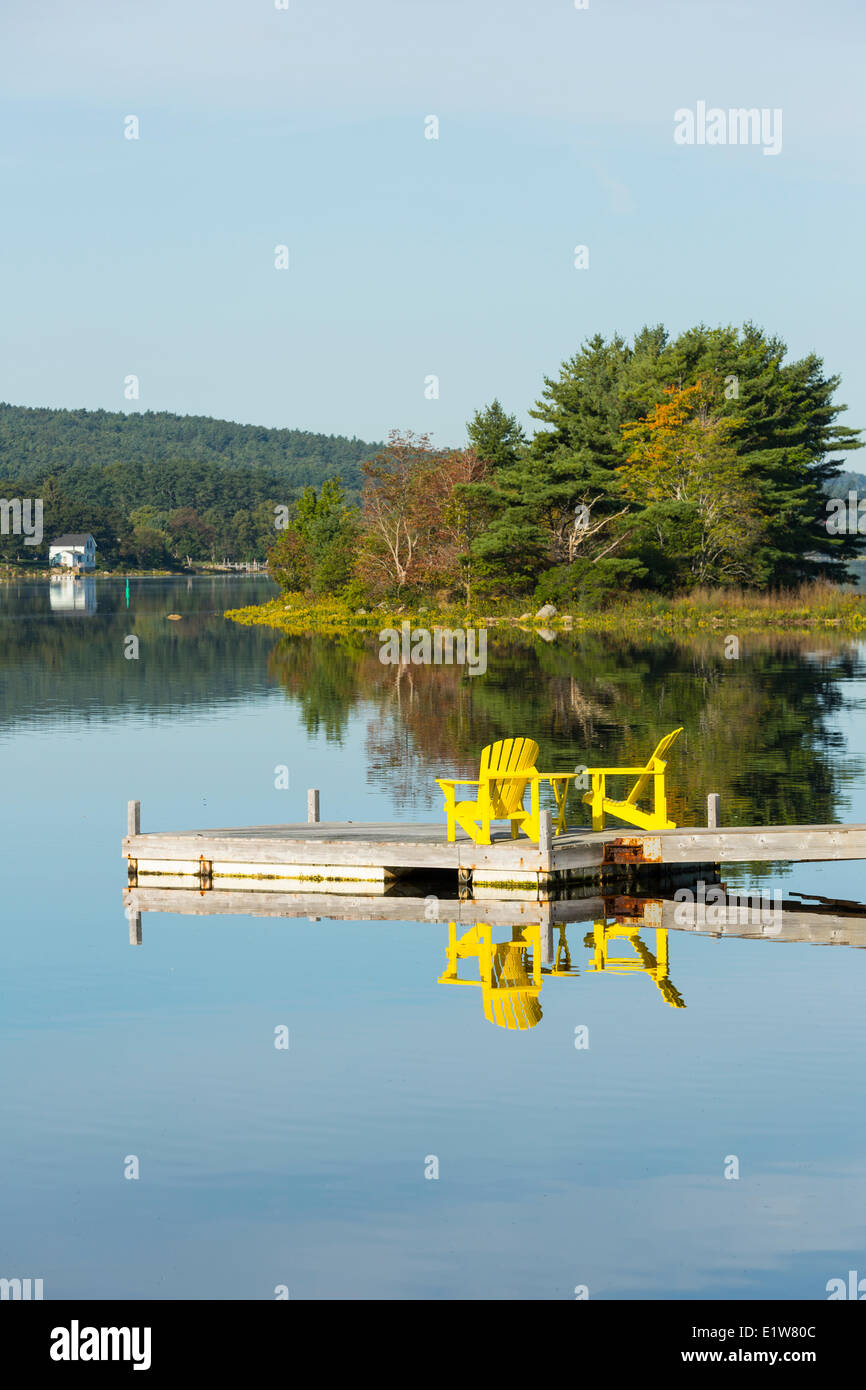 Adirondack chairs on wharf, Weagle Island, LaHave River, Nova Scotia