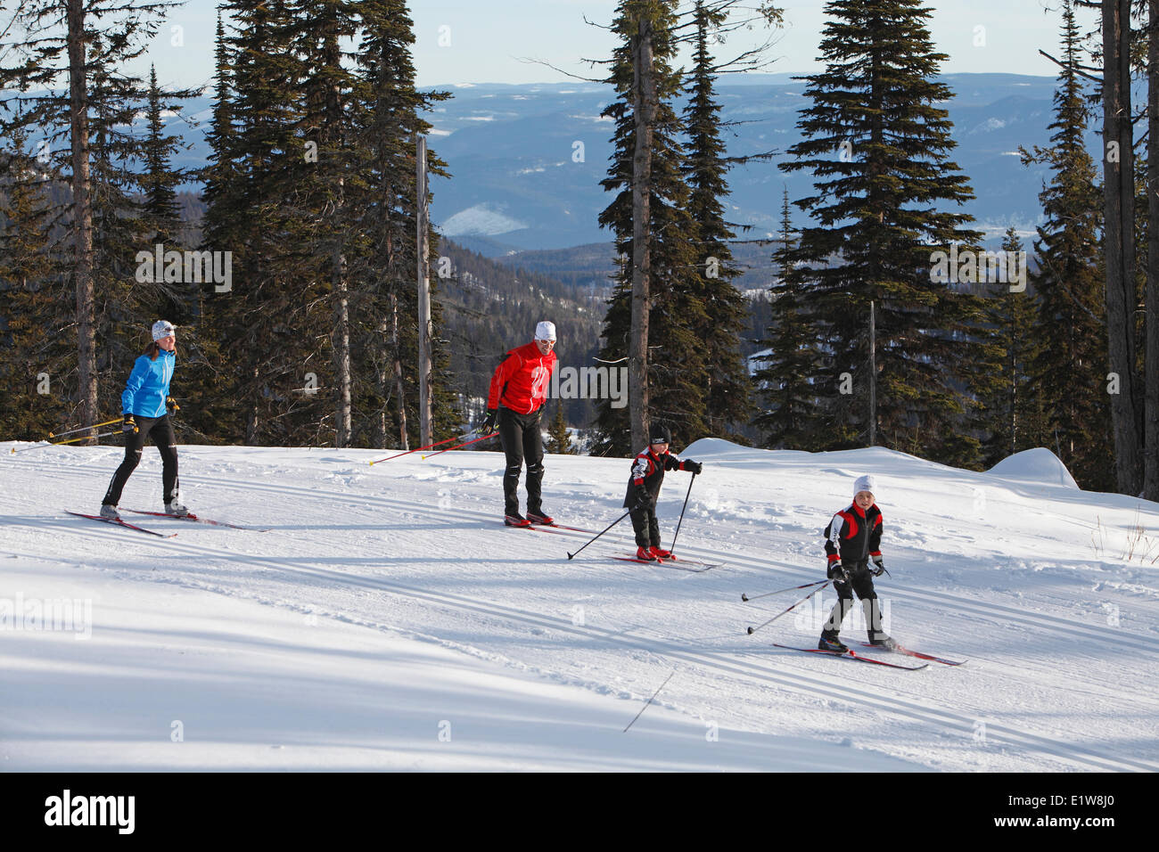 Young family Cross Country Skiing at Sovereign Lake Nordic Centre, near