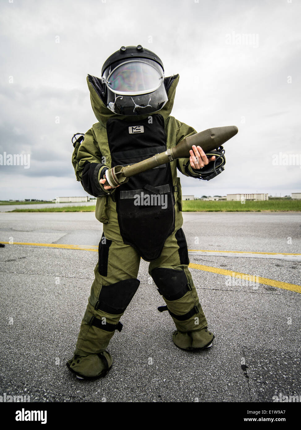 Local national ( Japanese ) tries on Bomb disposal suit at  Marine Corps Air Station Futenma Okinawa Japan Stock Photo