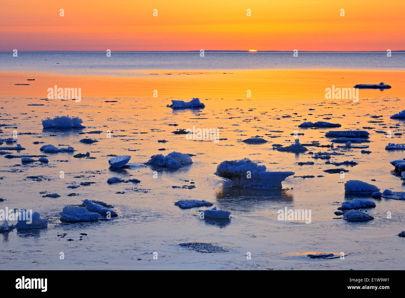 Ice on lake winnipeg in spring at dawn hires stock photography and