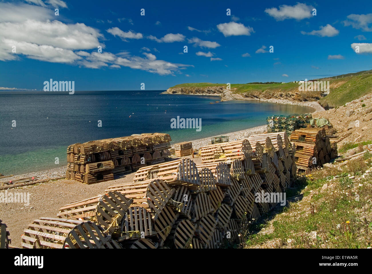 Lobster traps along St. Georges Bay, Newfoundland , Canada, fishing industry, clouds Stock Photo