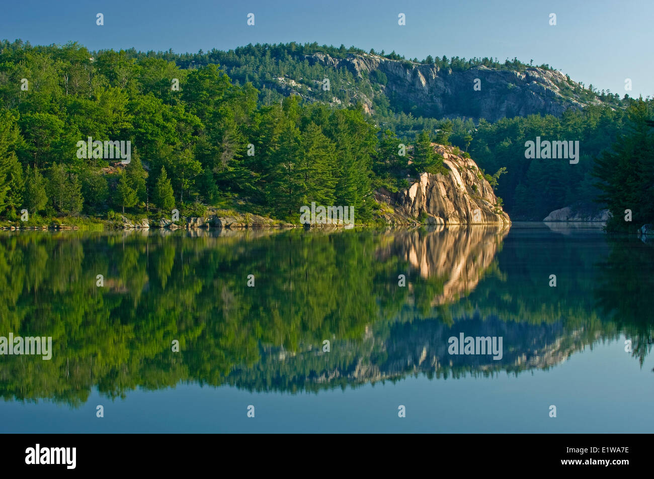 Reflection on George Lake, Killarney Provincial Park, Ontario, Canada Stock Photo