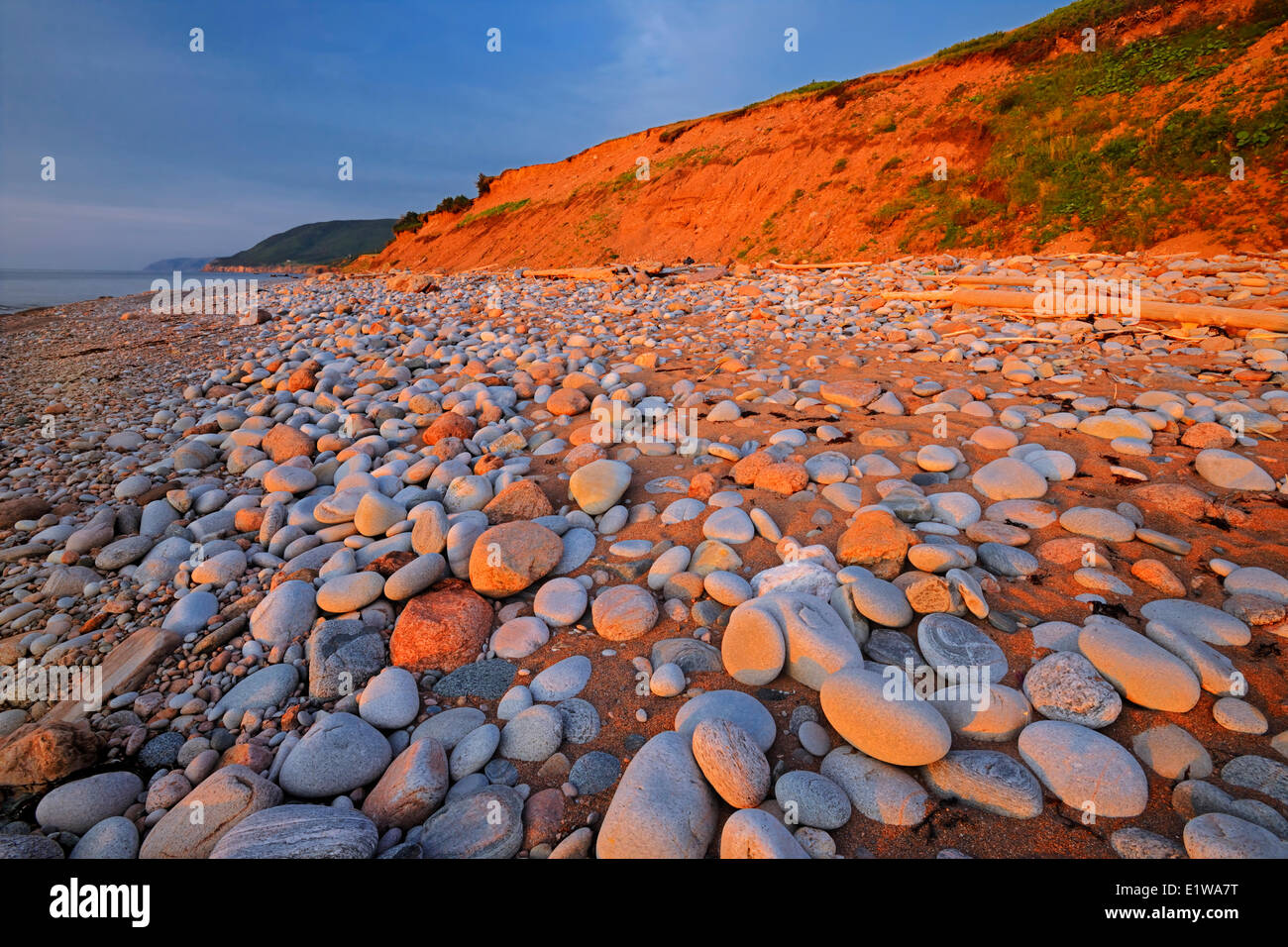 Rocky shoreline at sunset, Pleasant Bay, Cape Breton Island, Nova Scotia, Canada Stock Photo Alamy