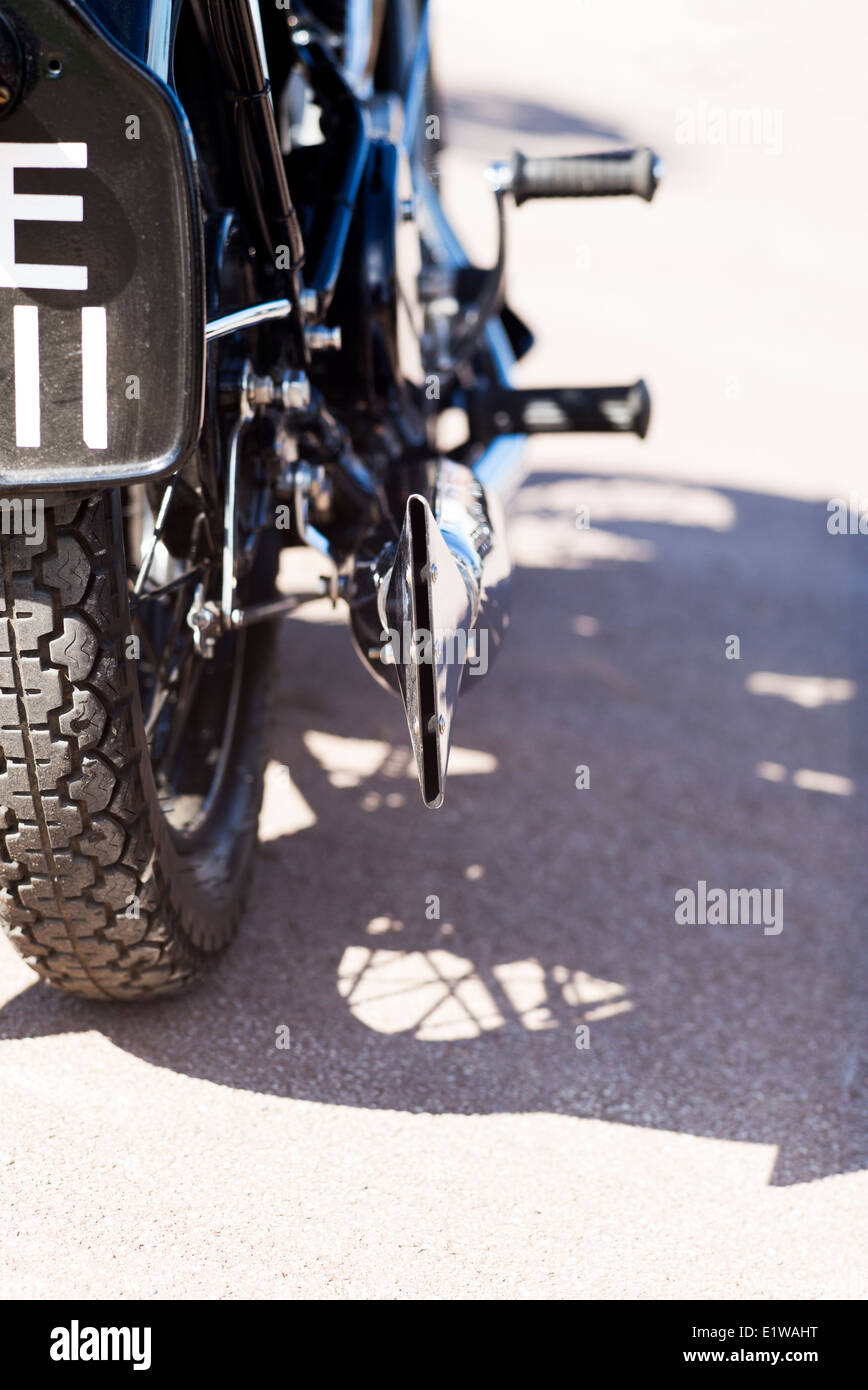 Vintage BSA fishtail exhaust pipe and bike shadow at The VMCC Banbury