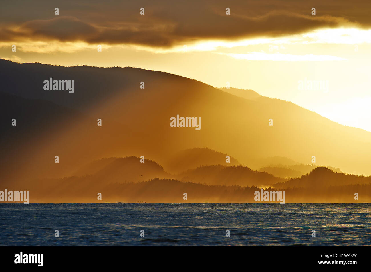 Crepuscular rays, God rays, Pacific Ocean, Inside Passage, Coastal Mountains, British Columbia, Canada Stock Photo