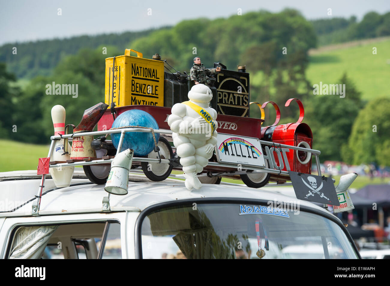 Retro collectibles on the roof rack of a Volkswagen camper van at a VW show. England Stock Photo