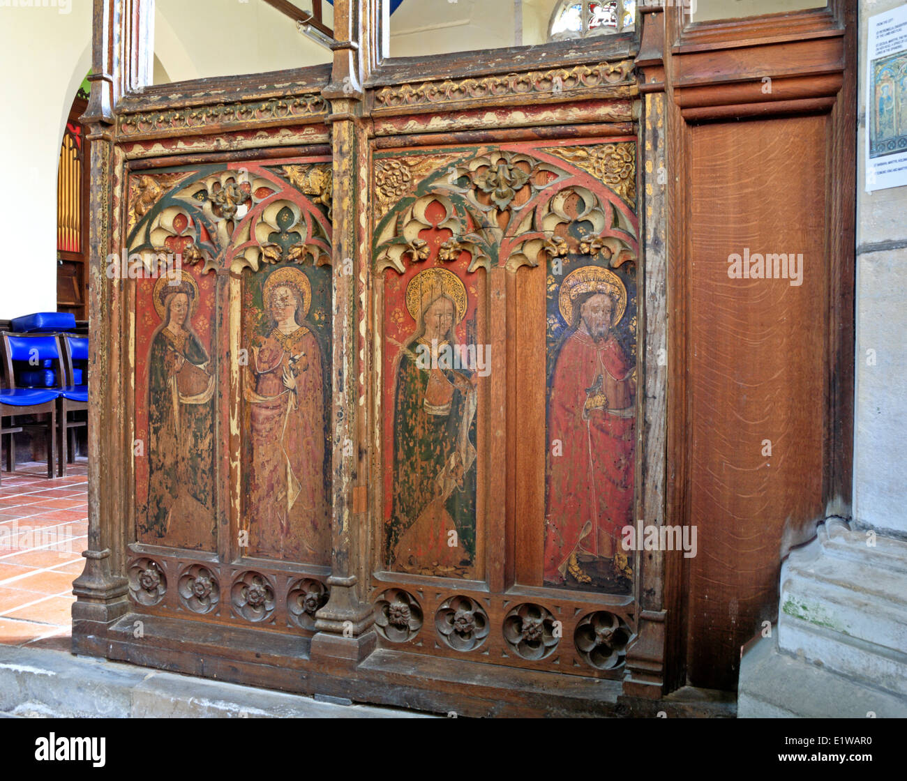 A view of the rood screen on the south side of the entrance to the chancel at Trimingham parish church, Norfolk, England, UK. Stock Photo