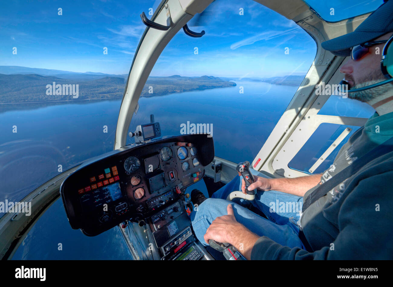 Helicopter pilot, Quesnel Lake, British Columbia, Canada Stock Photo