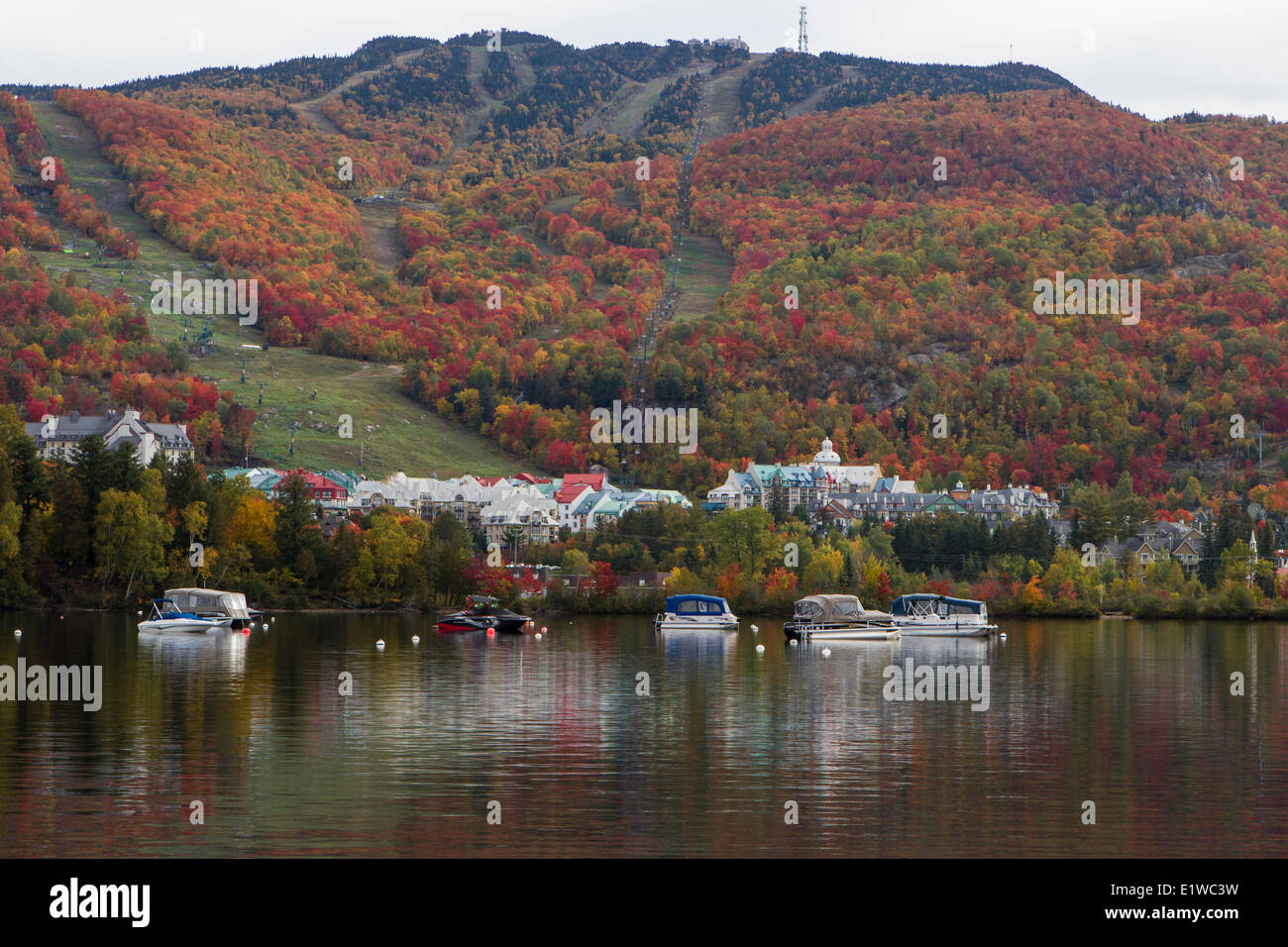 Looking across Lac Tremblant at MontTremblant ski resort in autumn