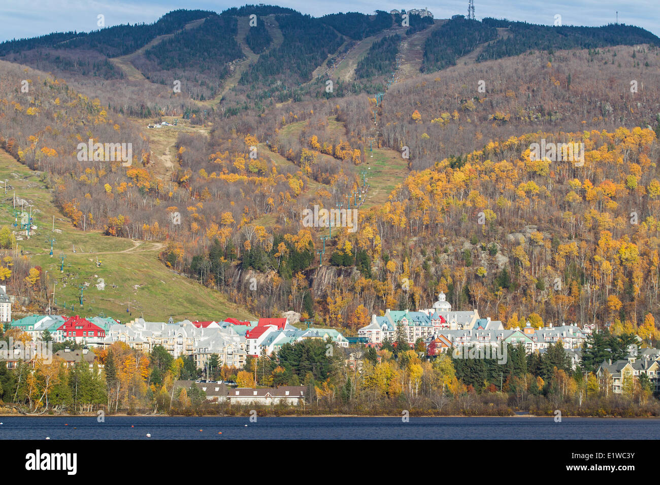 Looking across Lac Tremblant at MontTremblant ski resort in autumn