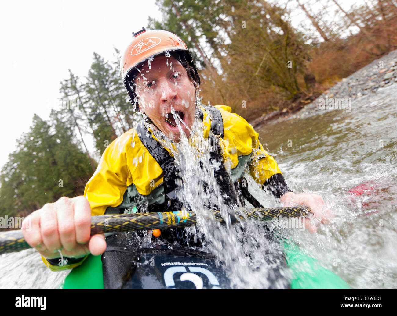 Dave Prothero comes out an eskimo roll while paddling on the Puntledge River near Courtenay.  Courtenay The Comox Valley Stock Photo