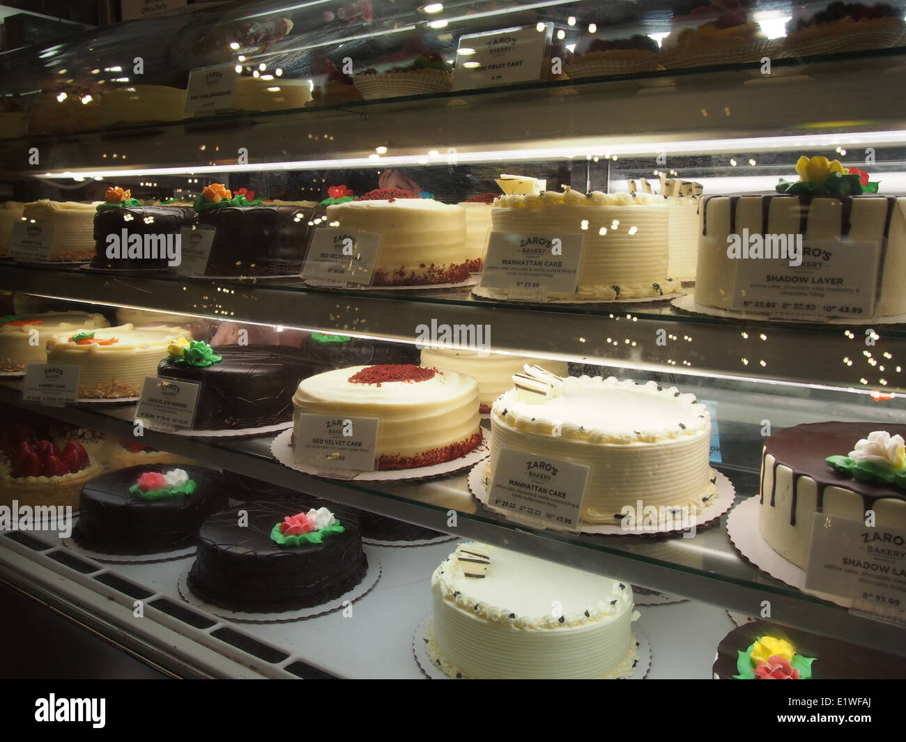 Cakes on display at Zaro's Bakery in Grand Central Station, New York, USA, May 30, 2014, © Katharine Andriotis Stock Photo