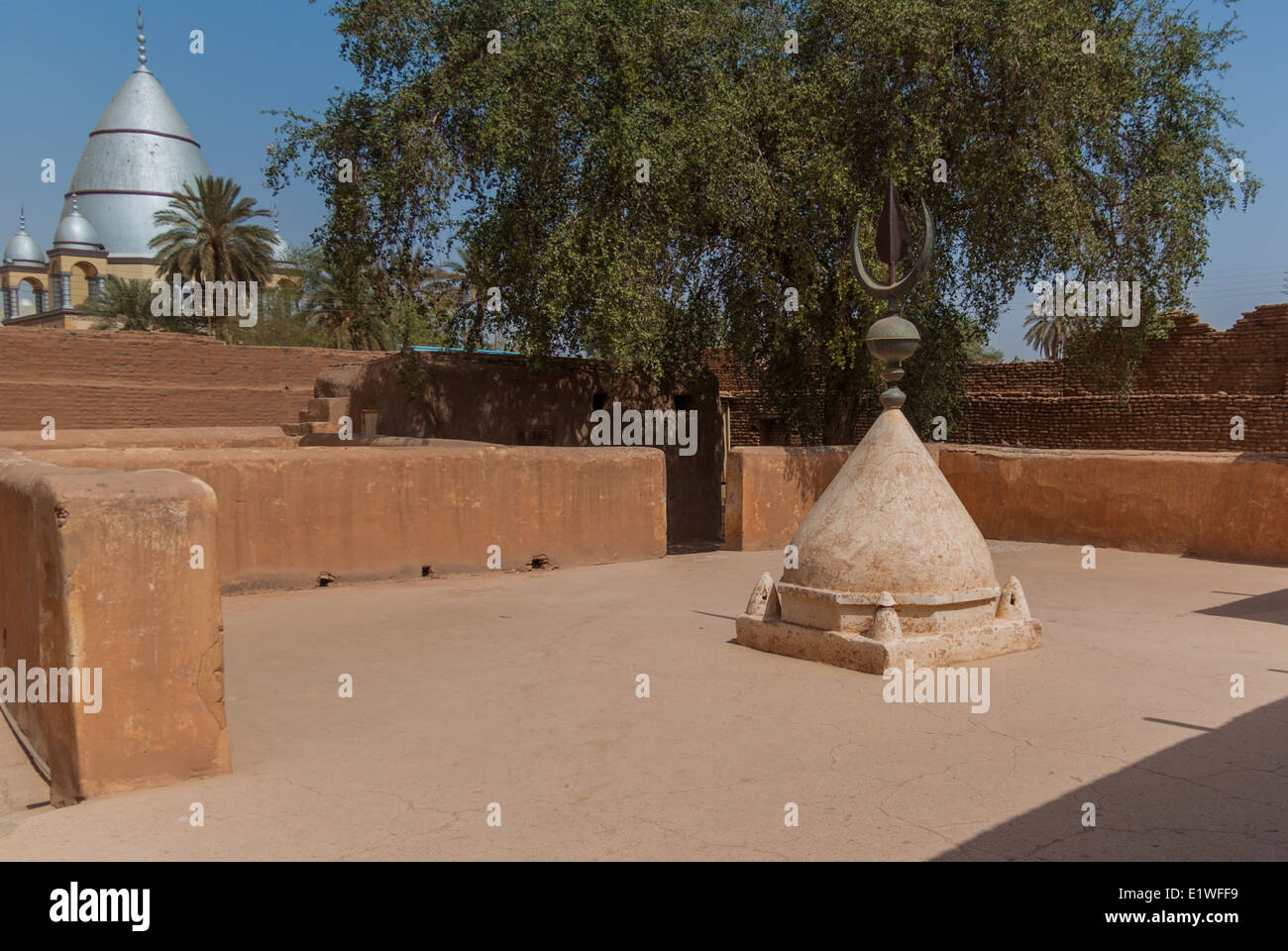 Cap from Original Tomb of al-Mahdi on Khalifa House's Yard and Rebuilt Tomb of al-Mahdi in background, Omdurman, Sudan Stock Photo