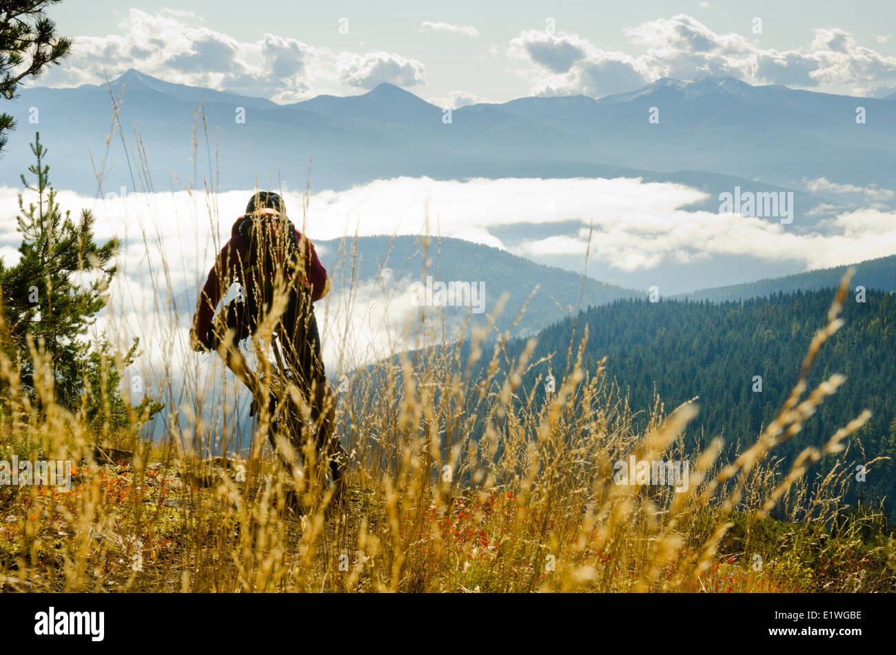 A mountain biker on a ride near Nelson, British Columbia Stock Photo