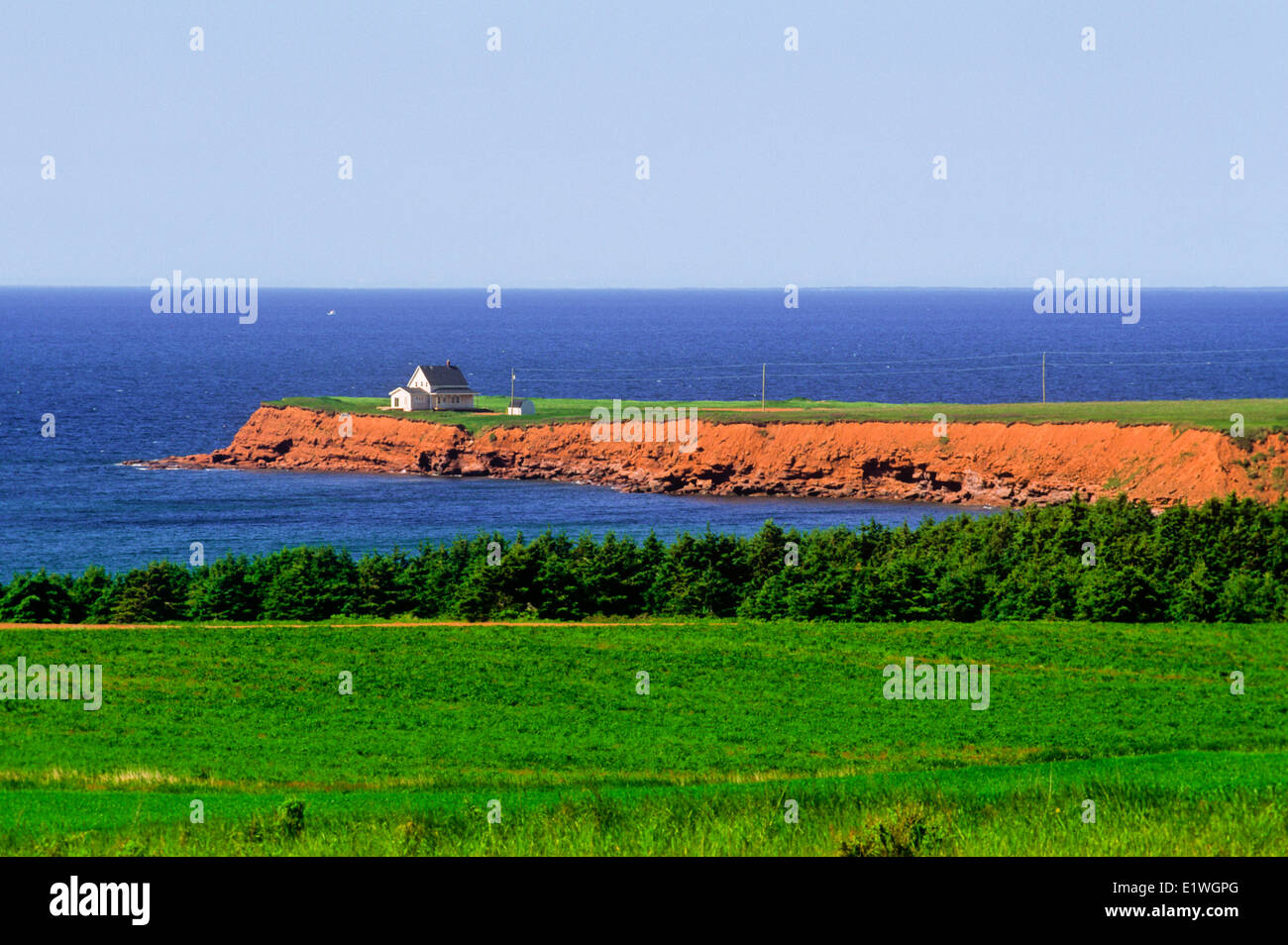 Cottage on eroding coastline, Chepstow, Prince Edward Island, Canada Stock Photo