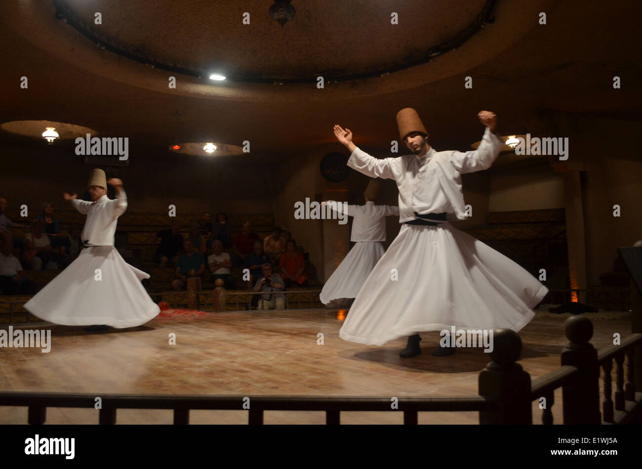 The whirling dervishes dance the'Sema'a journey through mindto reachperfection and a greater sense ofperfection of belief,class. Stock Photo