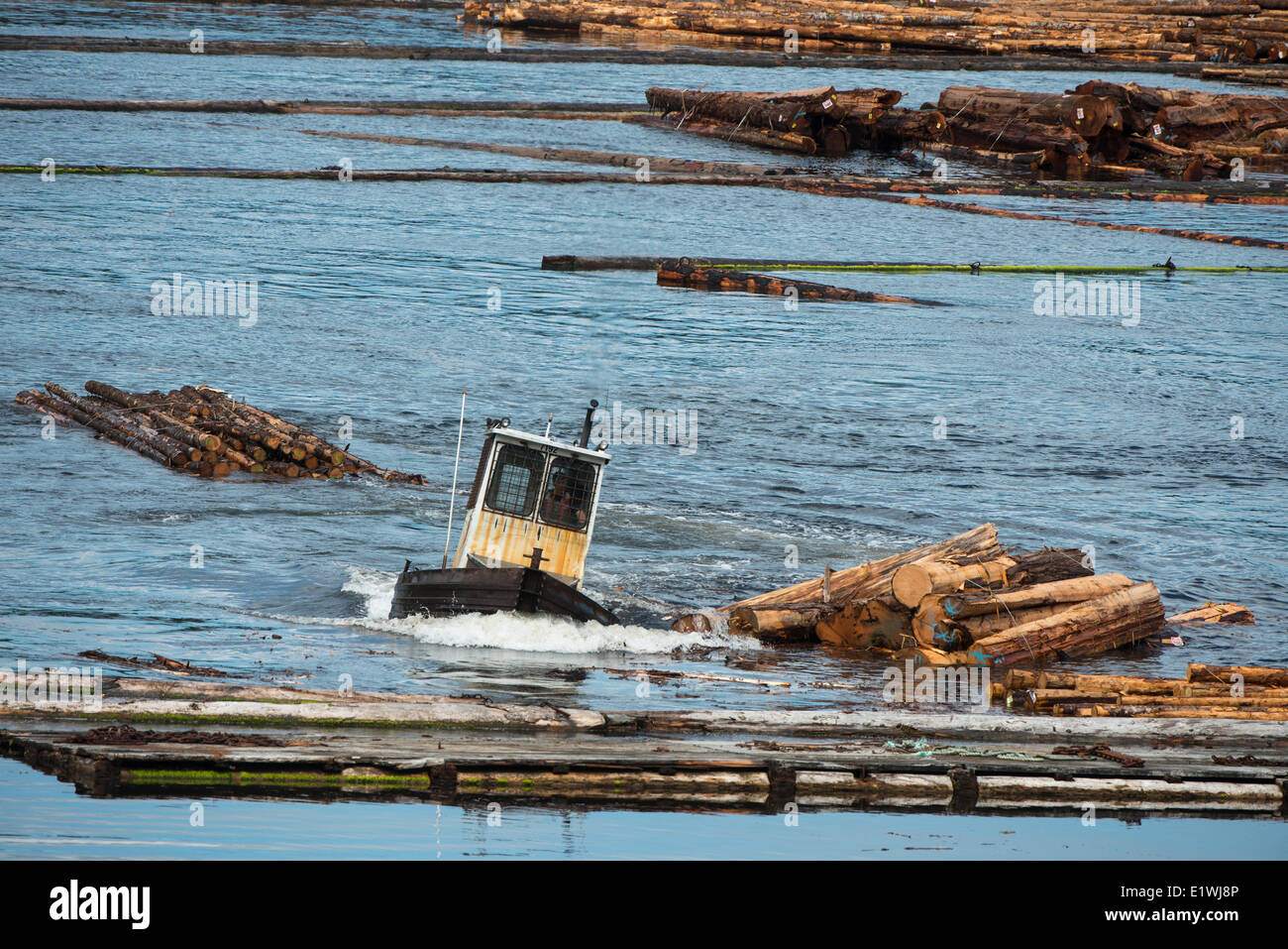 Boom boats at Beaver Cove, British Columbia, a small coastal village on the east coast of northern Vancouver Island, located at Stock Photo