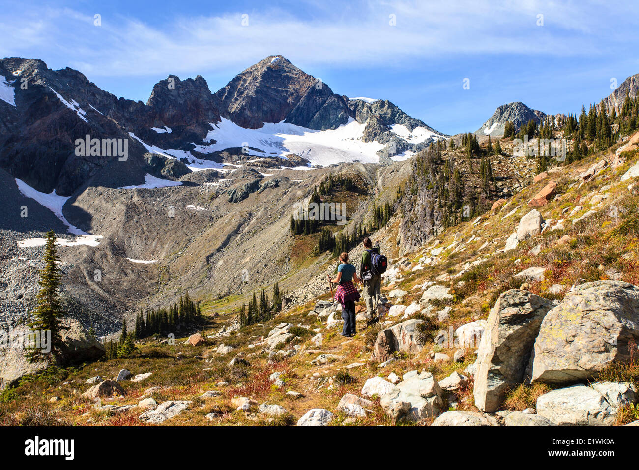 Male and female hikers on the trail at Whitewater Canyon, Goat Range