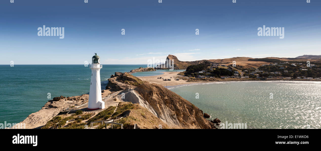 Rocky shoreline and the lighthouse at Castepoint, New Zealand (digitally spliced panorama) Stock Photo