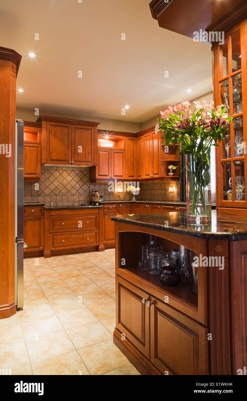 Kitchen Room With Wooden Cabinets Marble Countertops Ceramic Tile Floor Inside A Luxurious Cottage Style Residential Home Stock Photo Alamy