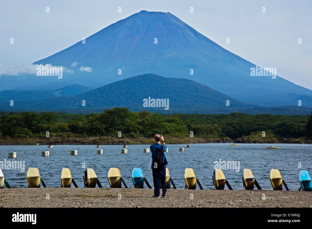 Mount Fuji as seen from the shores of Lake Shoji, the smallest of five lakes along the northern base of the volcano. Largely und Stock Photo