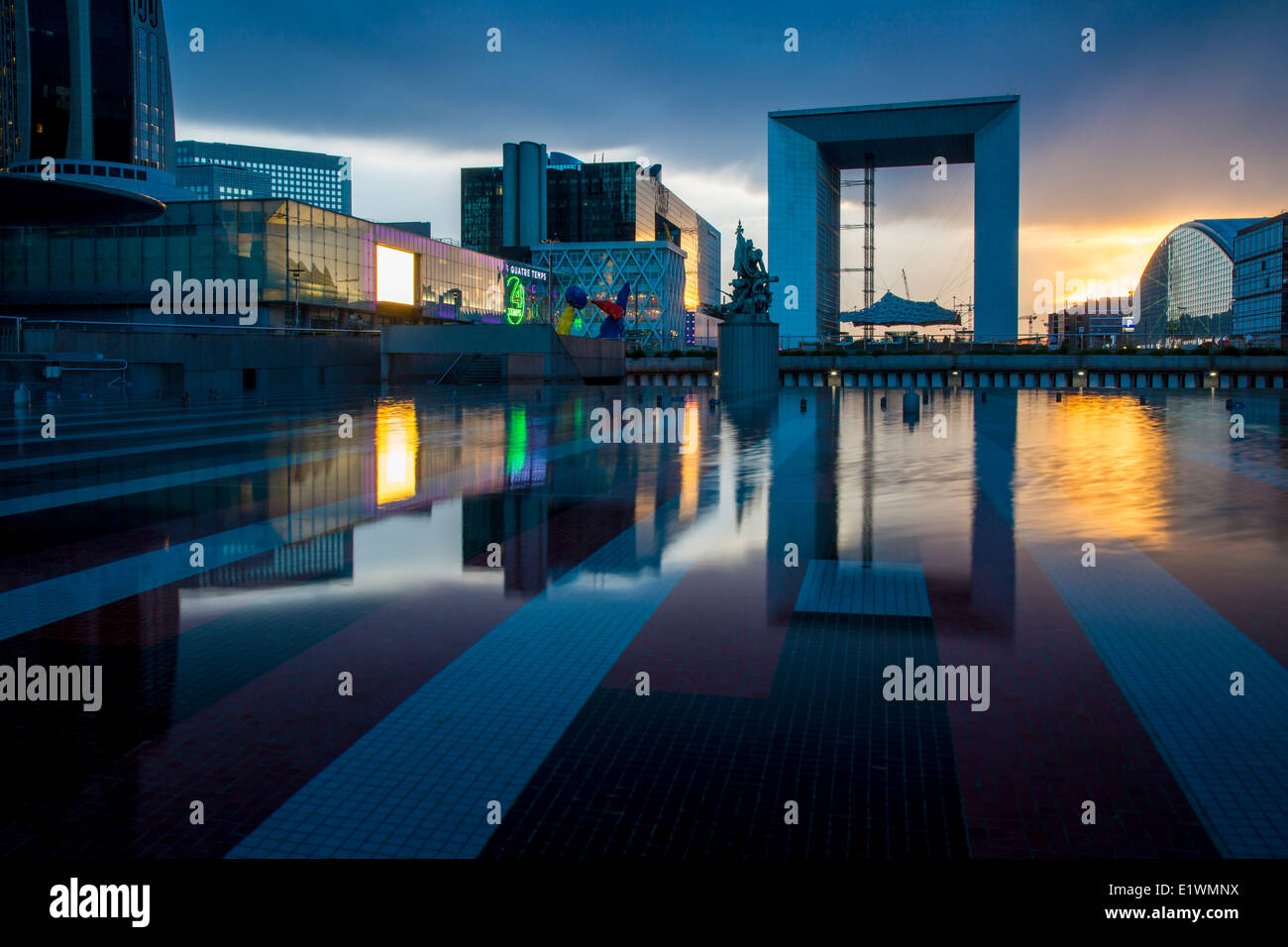 La Grande Arche de la Defense, and the modern buildings of La Defense district, Paris France Stock Photo