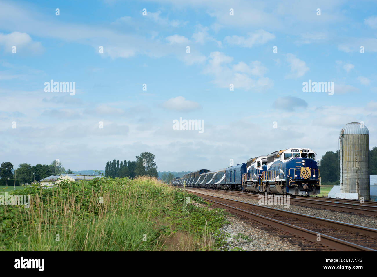 The Rocky Mountaineer travels through Matsqui, BC, Canada. Stock Photo