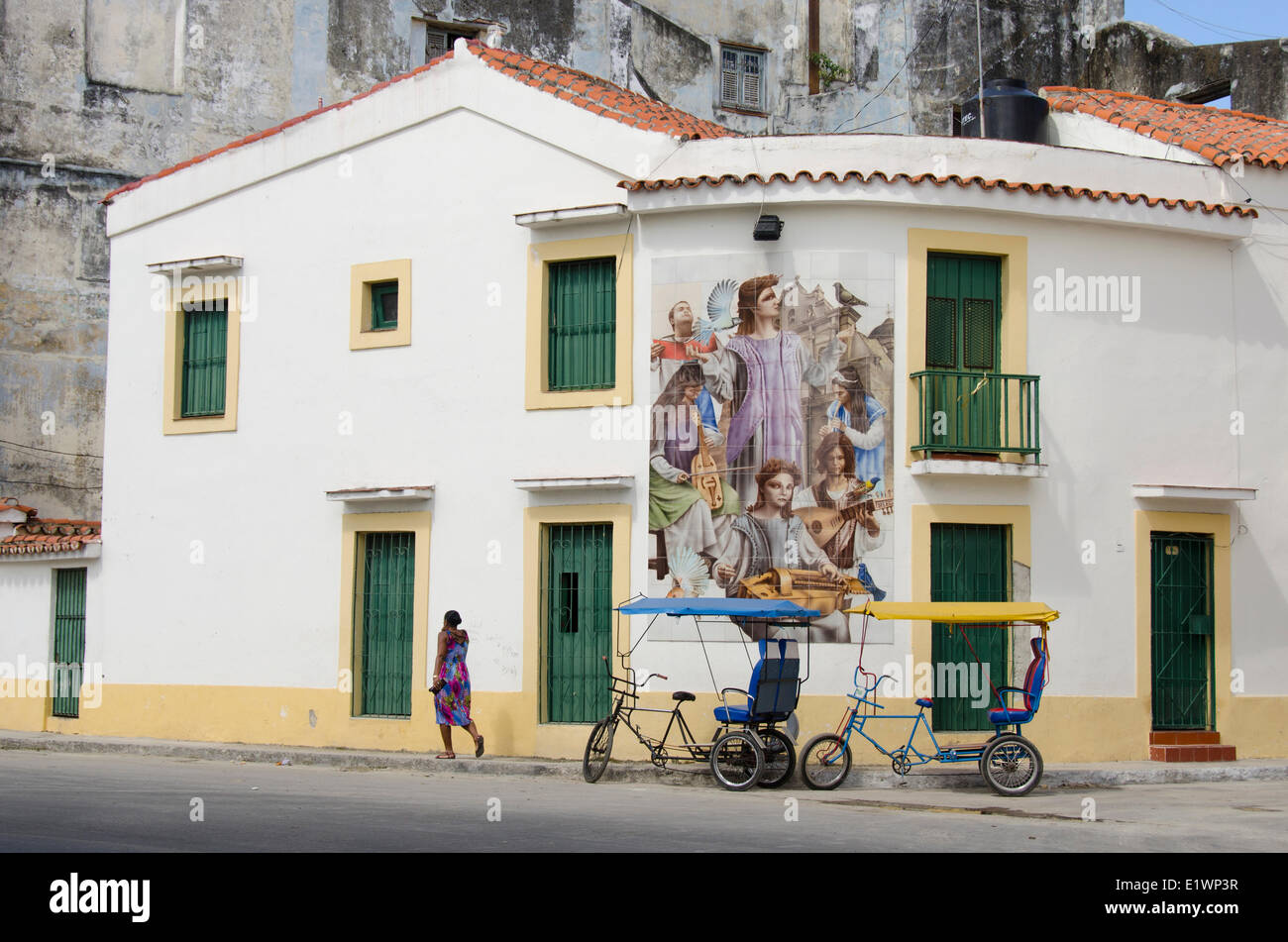 Decorative mural and pedicabs, Havana, Cuba Stock Photo