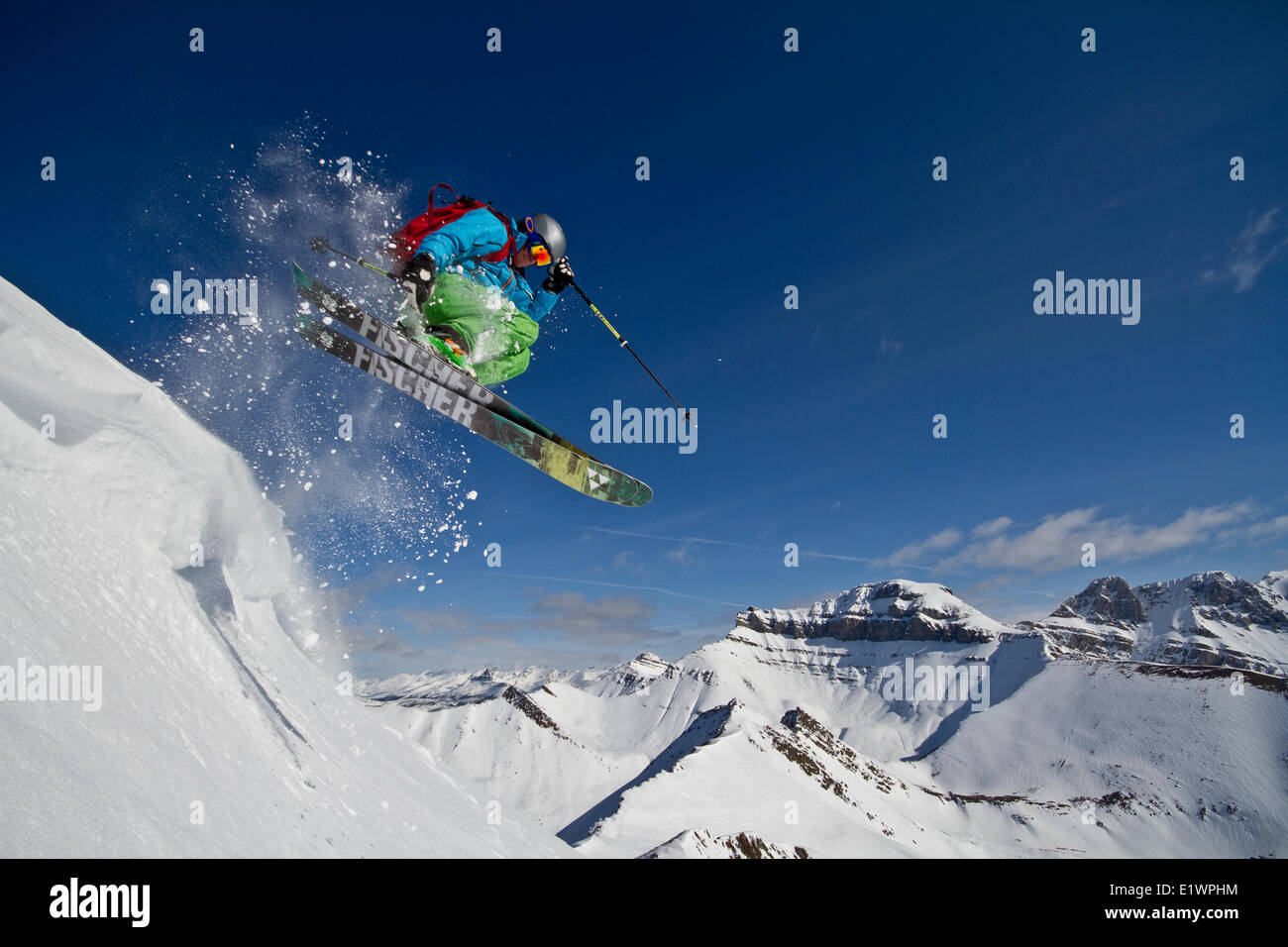 Young male skier catches air at Lake Louise Ski Resort, Alberta, Canada. Stock Photo