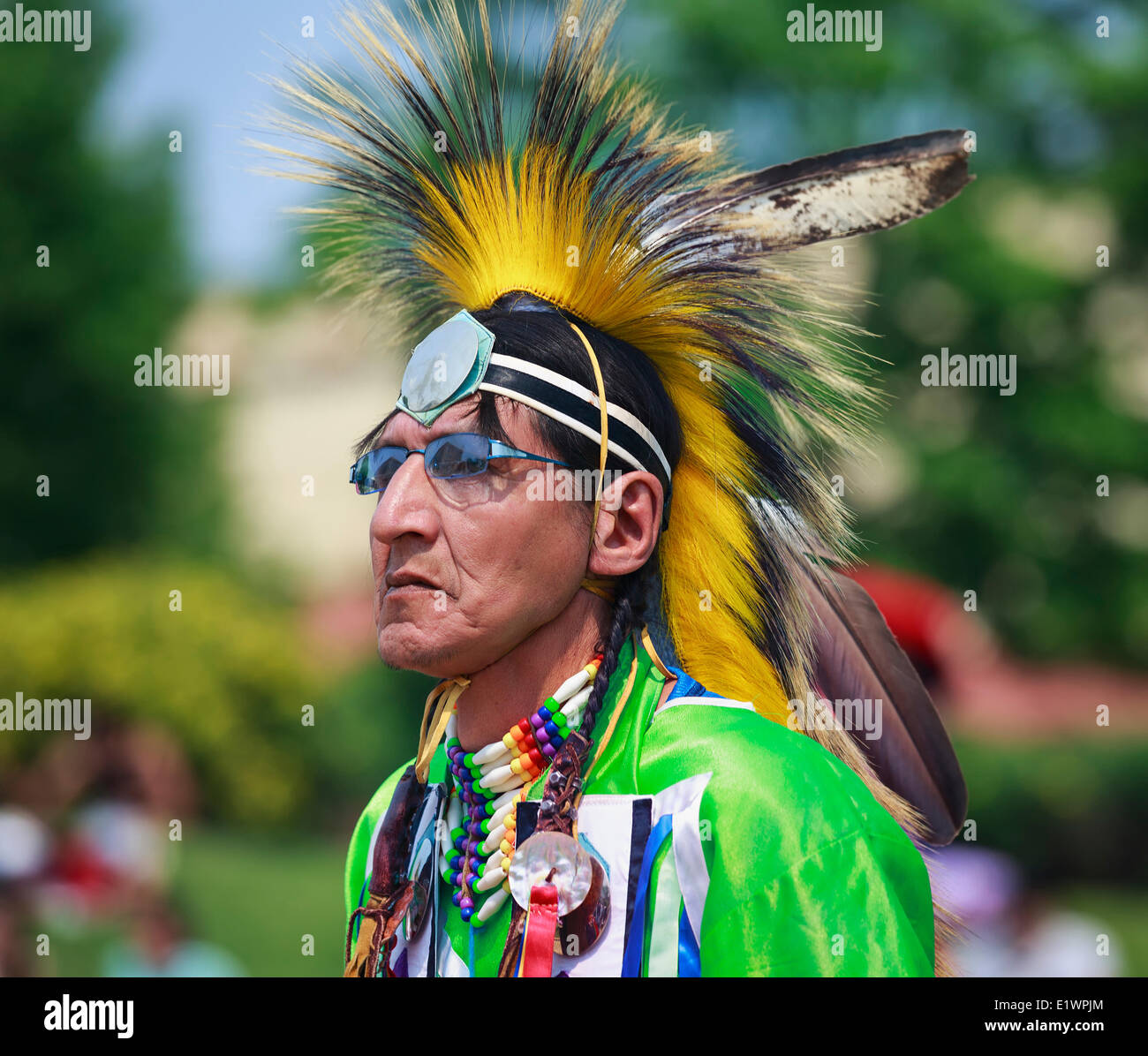 First Nations Elder in ceremonial headdress, Winnipeg, Manitoba, Canada Stock Photo
