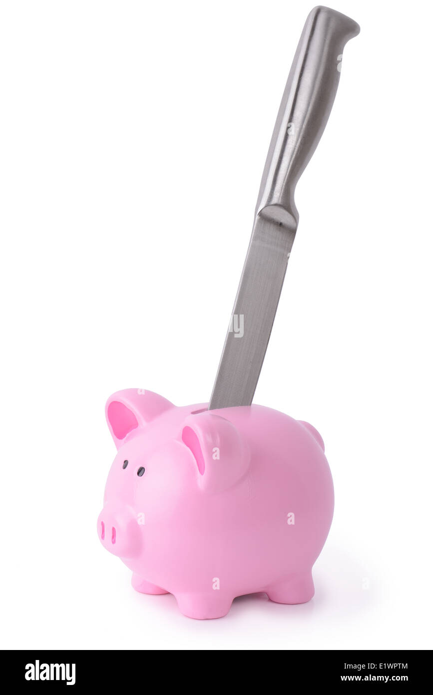 Piggy bank with a knife in its back, isolated on a white background Stock Photo
