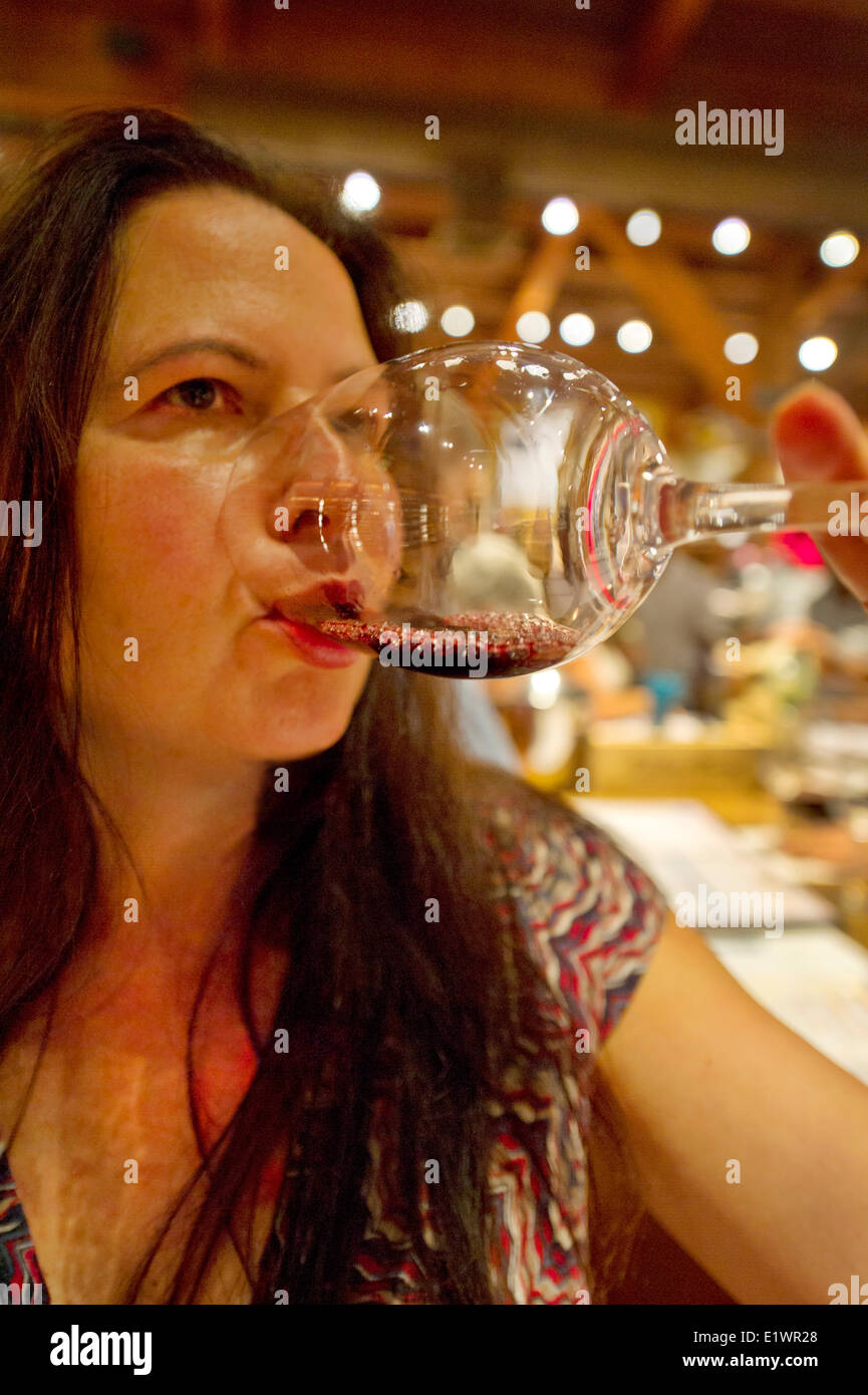 Woman tasting wine at a Napa Valley winery Stock Photo
