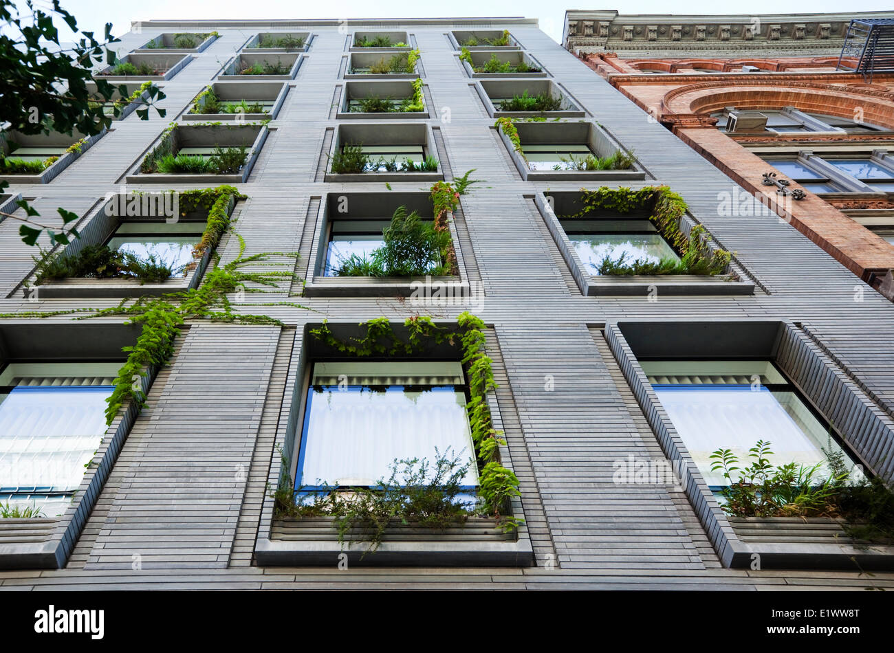 Vertical Garden Created By Discreetly Integrating Planter Boxes On