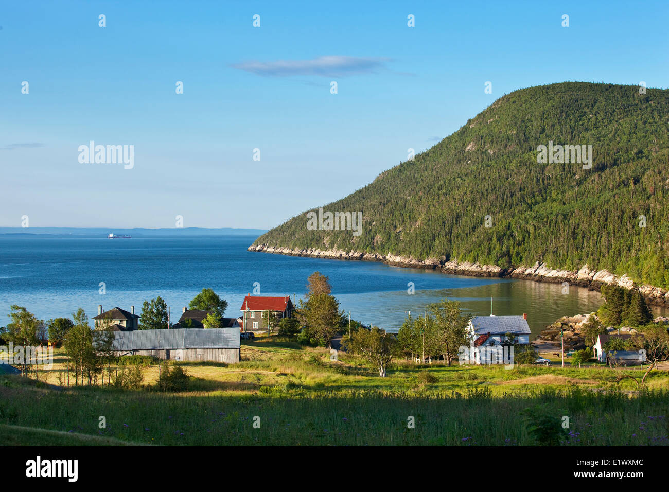 Early morning light on the coastal village of Port-au-Persil along the St. Lawrence River, Charlevoix, Quebec, Canada Stock Photo