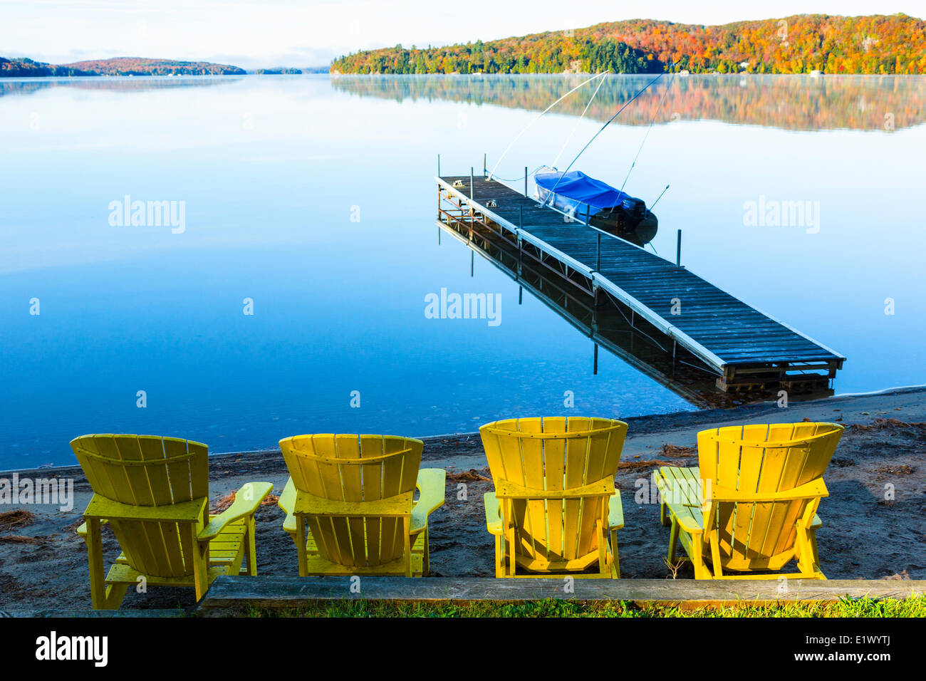 Muskoka chairs and dock, Lake of Bays, Muskoka, Ontario, Canada Stock Photo